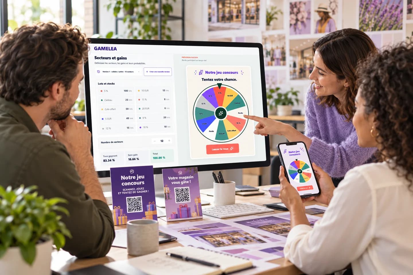 Illustration d’une équipe préparant une campagne Gamelea avec la roue et les supports QR code